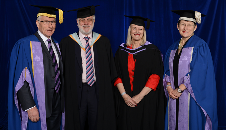 With Julie, left to right: Chair of the Board of Governors, John Hartley; Director of the Business School, Professor Aidan Berry and Vice-Chancellor of the university, Professor Debra Humphris.